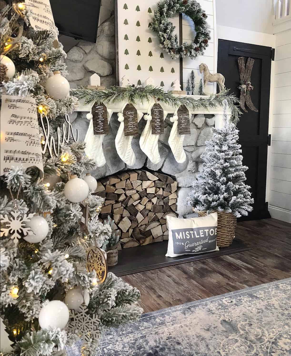 Living Room Farmhouse Mantel with Flocked Garland, Stockings, and Trees — Winter Mantel Decor