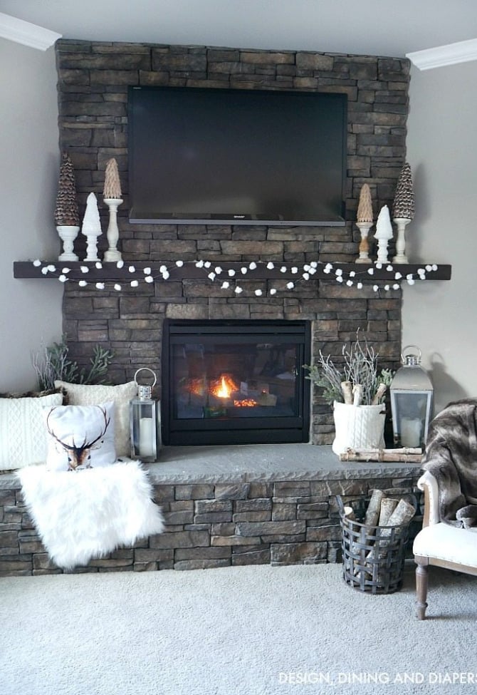 Rustic Stone Fireplace with Dark Wood Mantel and Cozy Pillows — Winter Mantel Decor