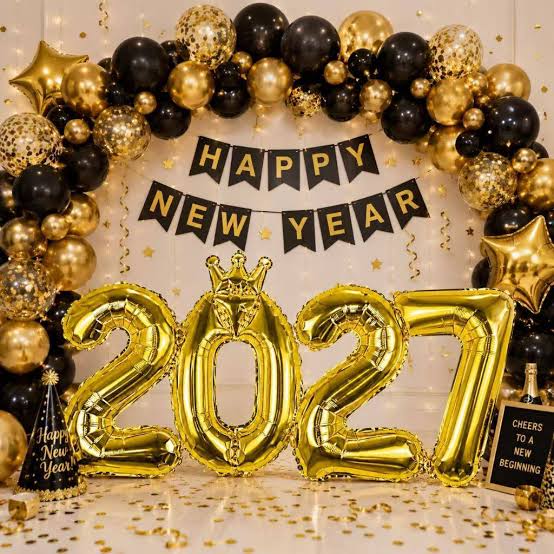 Dramatic Gold Foil '2027' Balloons Against a Sequin Wall — New Years Eve Party 2027