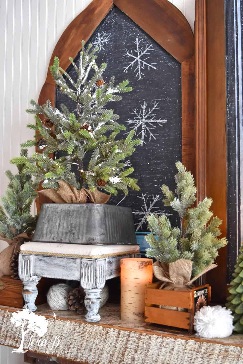 Rustic Farmhouse Mantel with Flocked Trees and Snowflake Art — Winter Mantel Decor