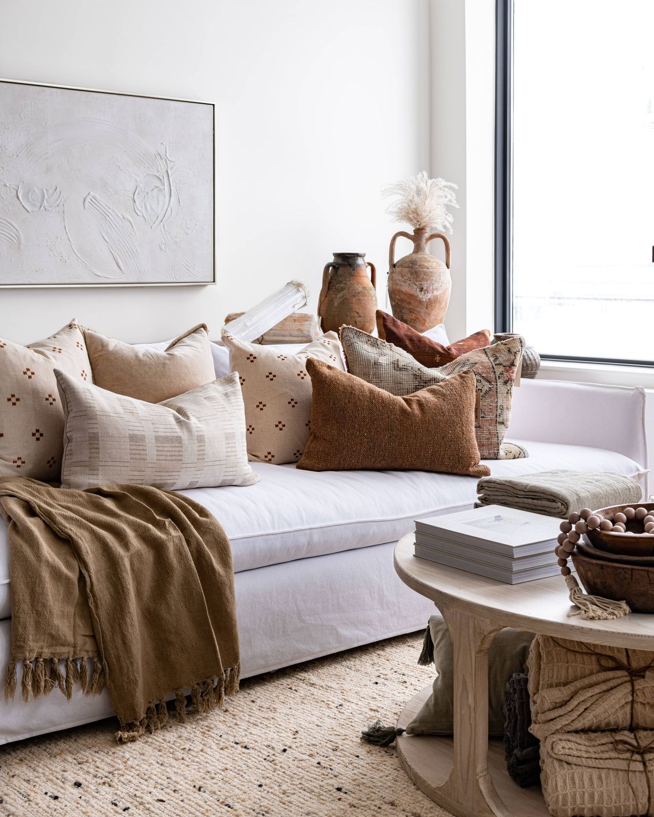 Boho Hygge Sofa with Textured Cushions in Earthy Tones — Hygge Home Decor