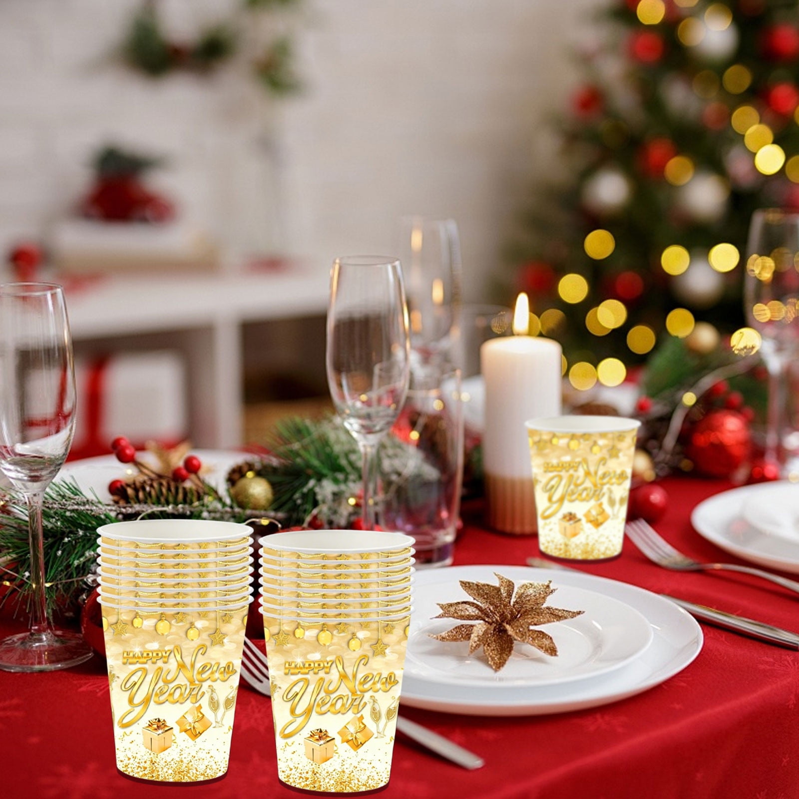 Gold 'Happy New Year' Paper Cups on a Red Tablecloth — Gold New Years Eve Decor