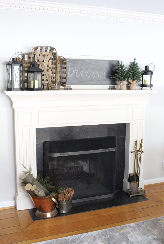 Rustic Mantel with Black Lanterns and Mini Evergreen Trees — Winter Mantel Decor