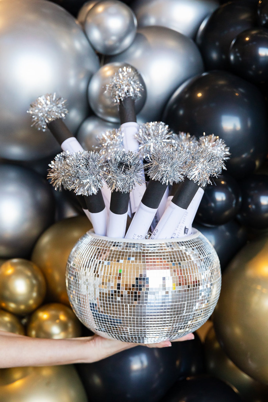 Festive Noisemakers in a Disco Ball Bowl — New Years Eve Party Decor