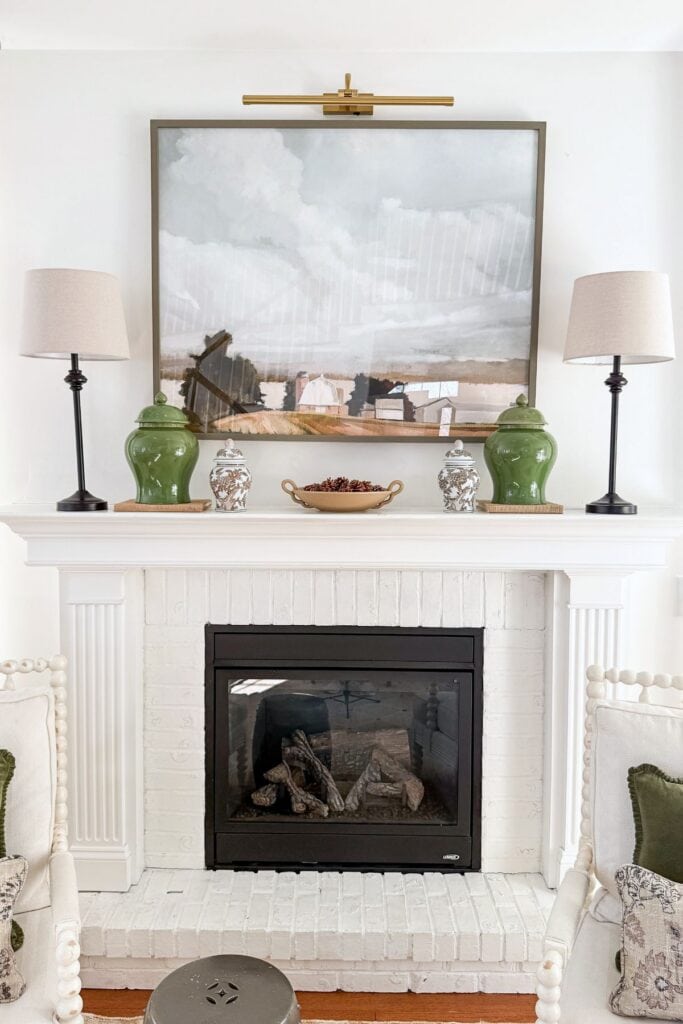 Farmhouse Mantel with Landscape Art and Green Ginger Jars — Winter Mantel Decor