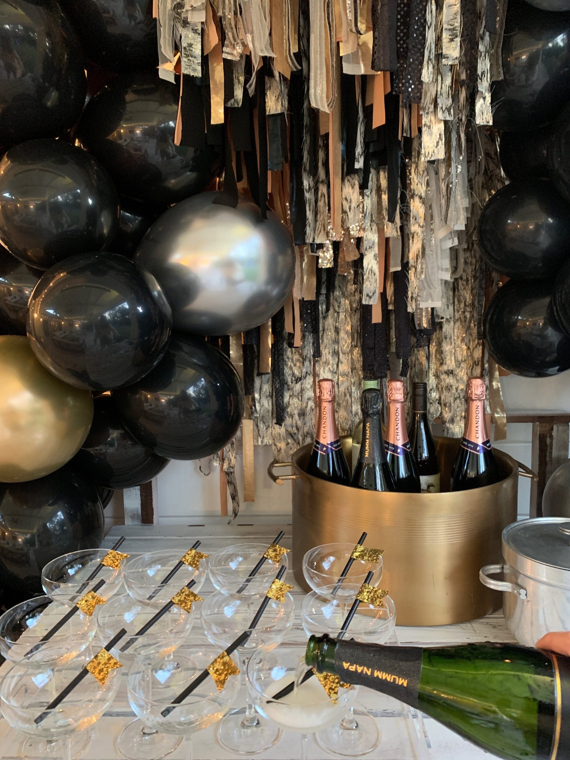Glamorous Party Bar with Champagne Bottles and Gold Accents — New Years Eve Party Decor