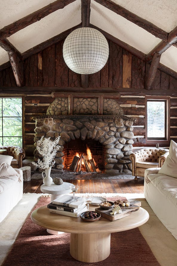Rustic Cabin Living Room with Stone Fireplace and Leather Armchairs — Winter Home Decor