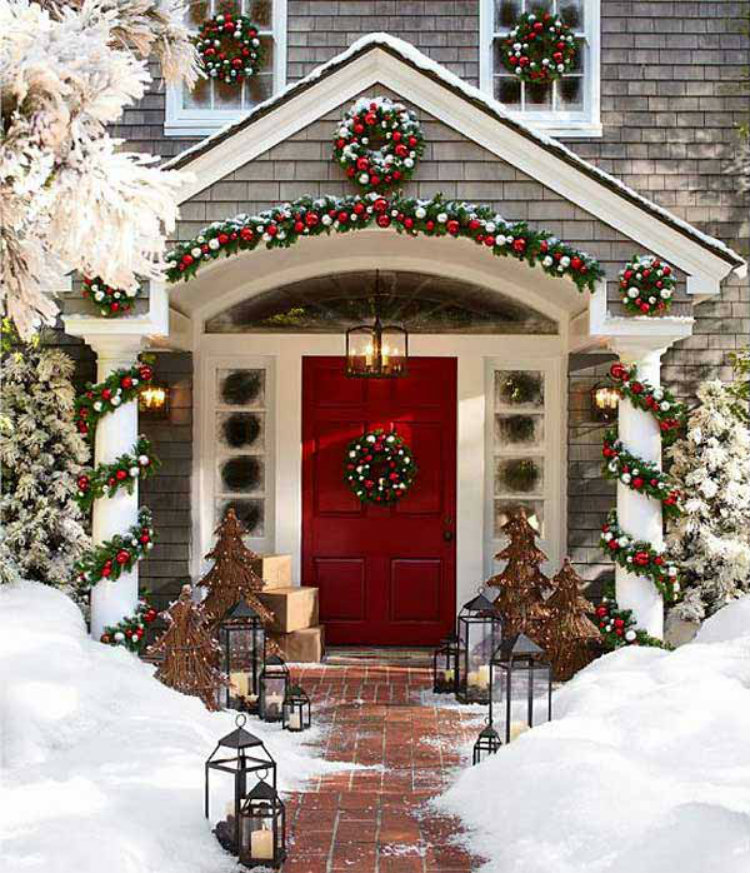 Magical Snowy Scene with Red Door and Abundant Decor — Winter Front Door Decor