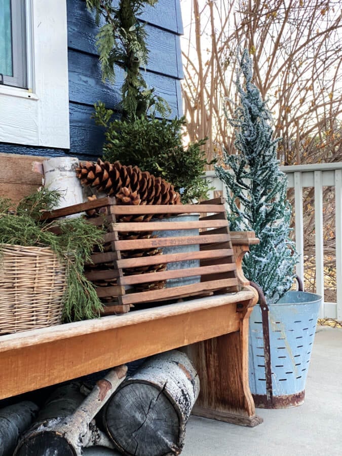 Rustic Bench Display with Frosted Tree and Logs Rustic Bench Display with Frosted Tree and Logs — Winter Porch Decor