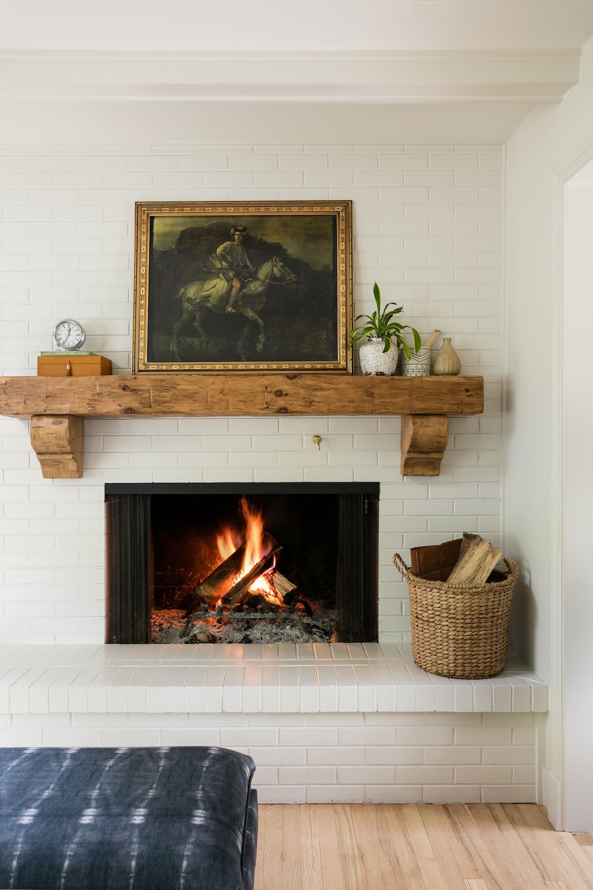 Traditional Mantel with Chunky Wood, Art, and Logs — Winter Mantel Decor