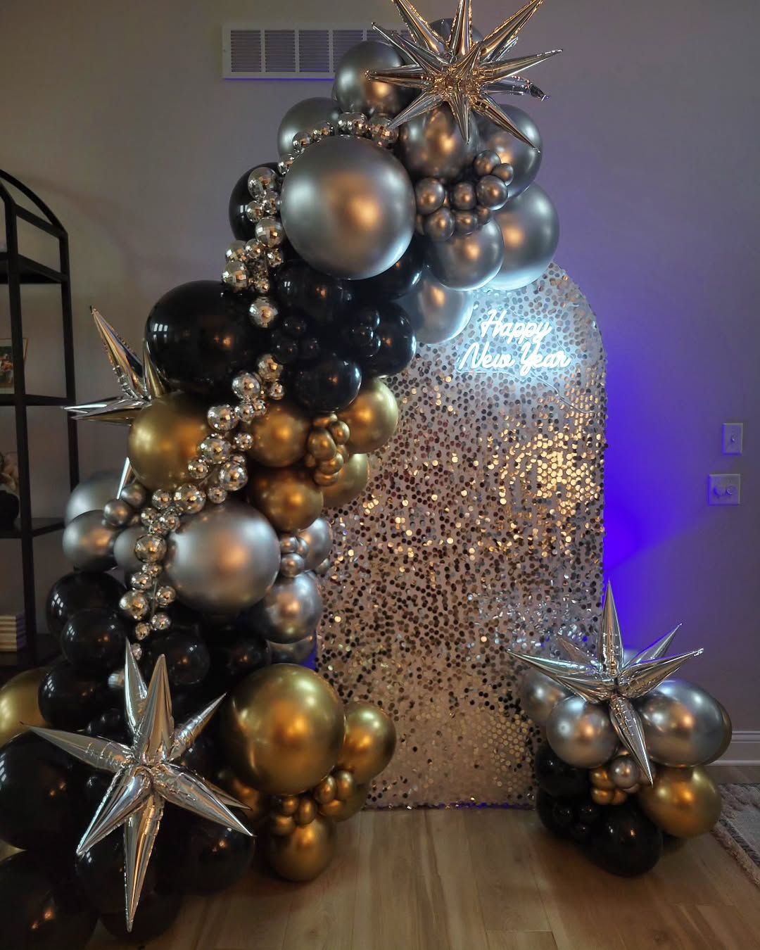 Black, Gold, and Silver Balloon Arch with Neon Sign — New Years Eve Balloon Garland