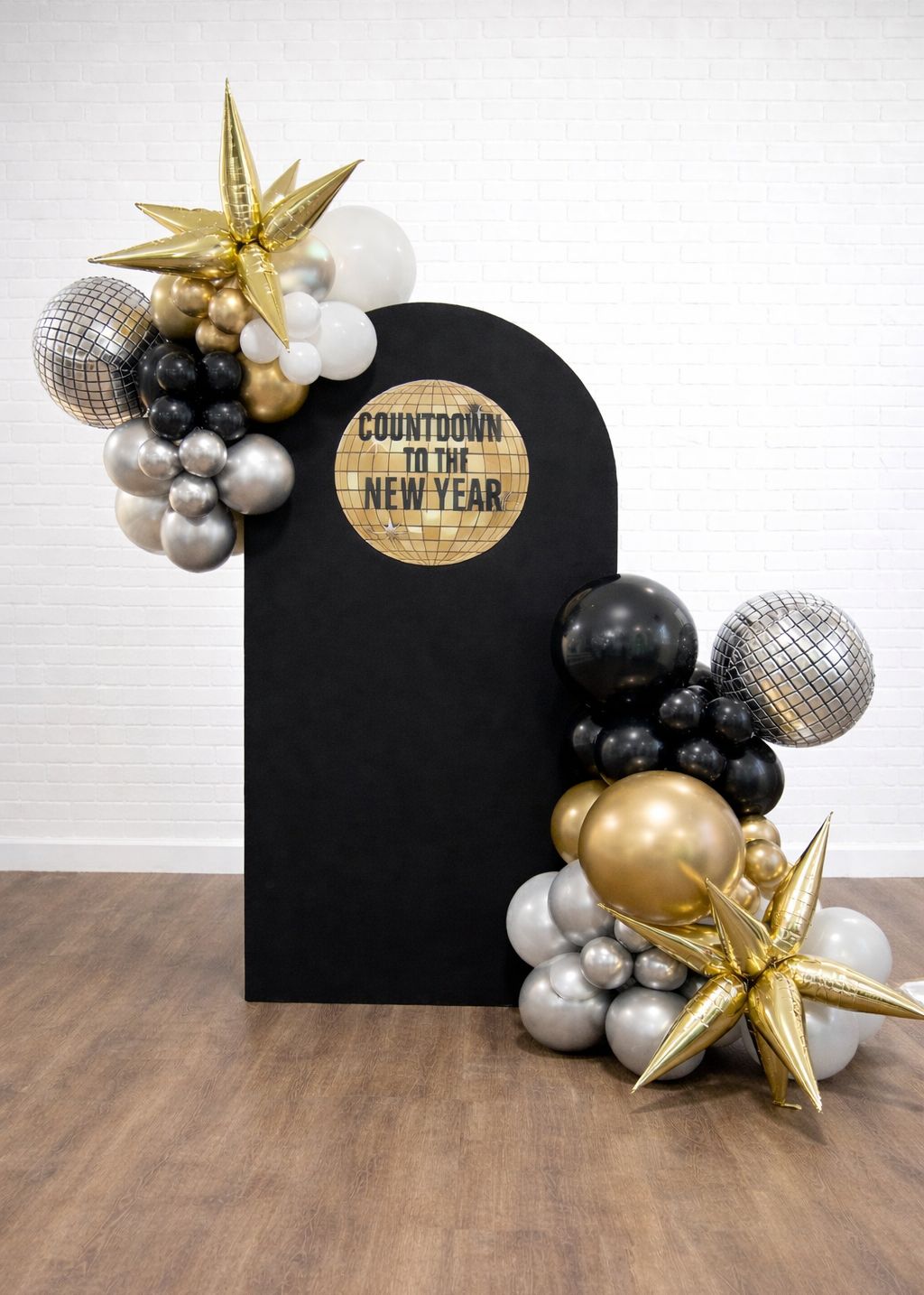 Modern Balloon Garland Framing a 'Countdown' Backdrop — New Years Eve Balloon Garland