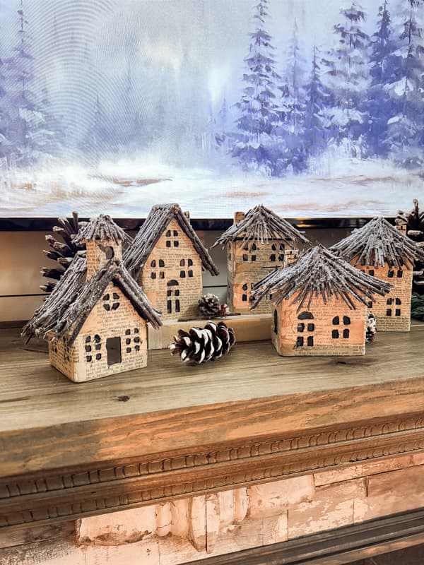 Rustic Wooden Mantel with Handmade Winter Village Houses — Winter Mantel Decor