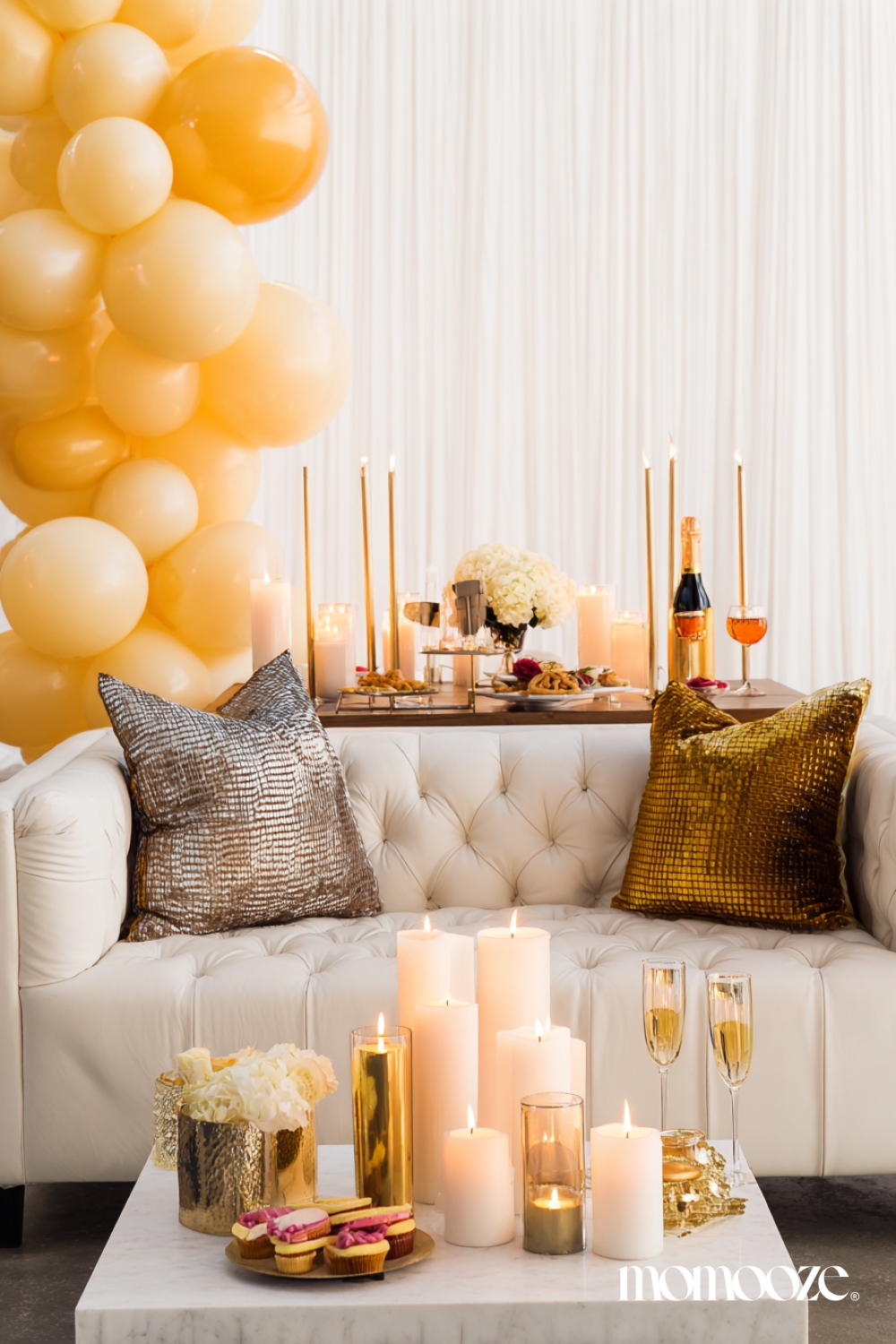 Glamorous Living Room with Cream Balloon Garland and Metallic Accents — New Years Eve Party Decor