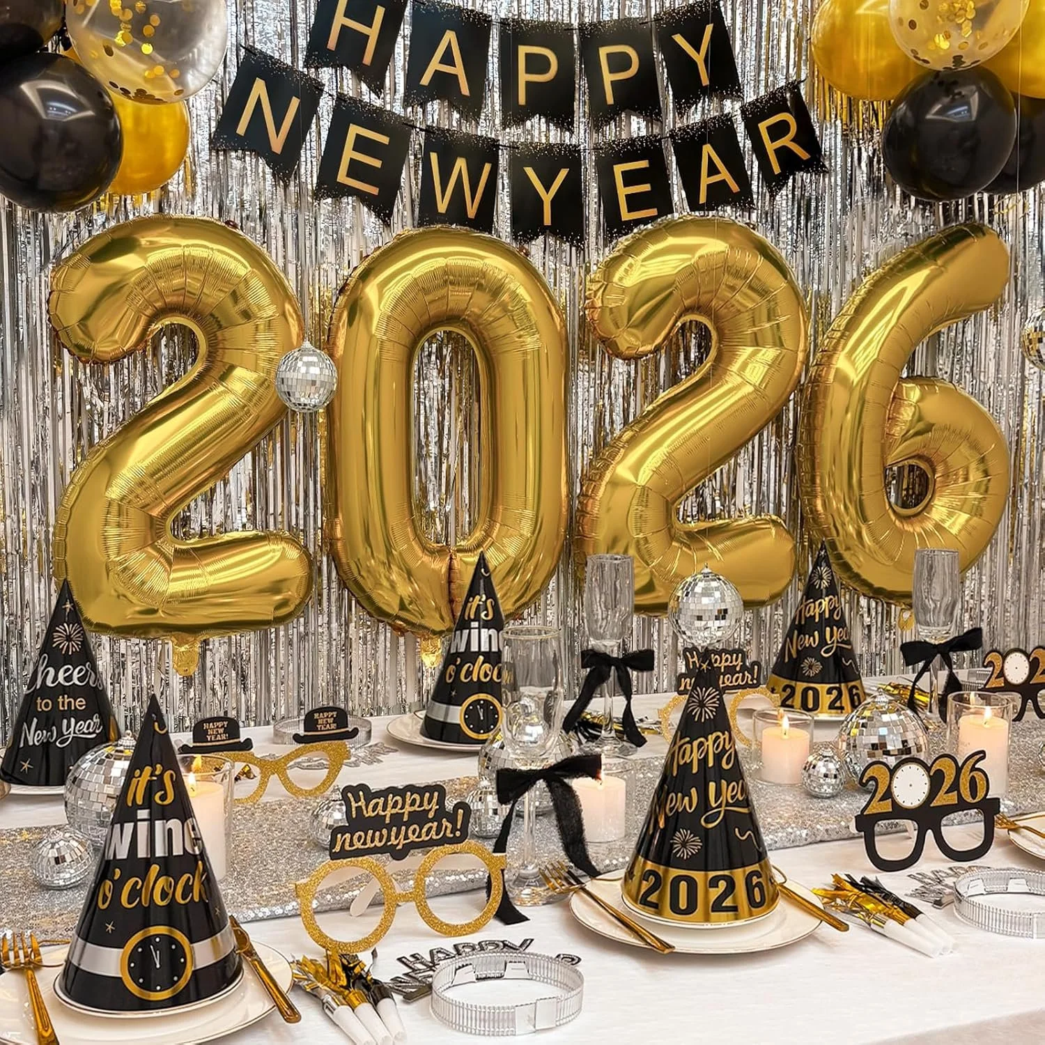 Giant Gold '2026' Balloons Dominating a Festive Party Table — Gold New Years Eve Decor