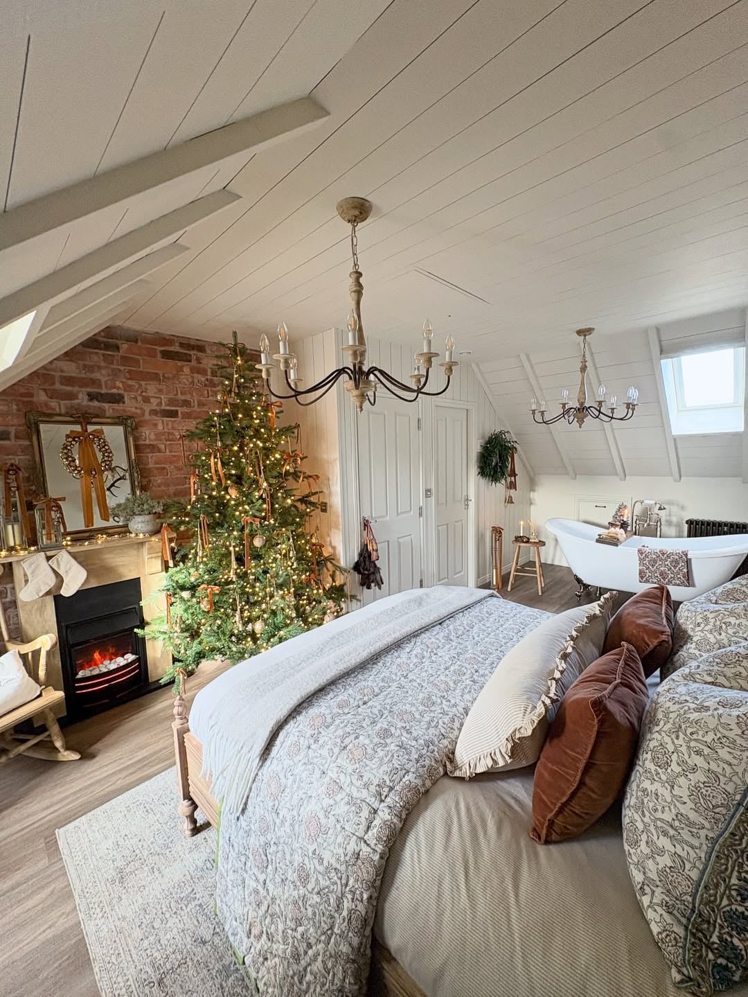 Christmas Bedroom with Fireplace and Unique Bathtub Feature — cozy christmas bedroom 2026