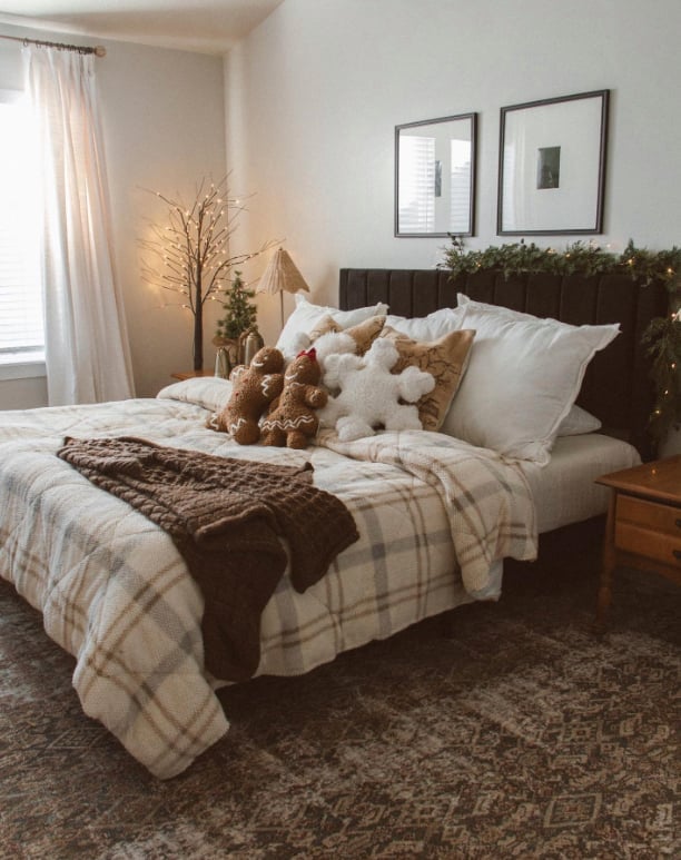 Farmhouse Bedroom with Gingerbread Pillows and Garland — cozy christmas bedroom 2026