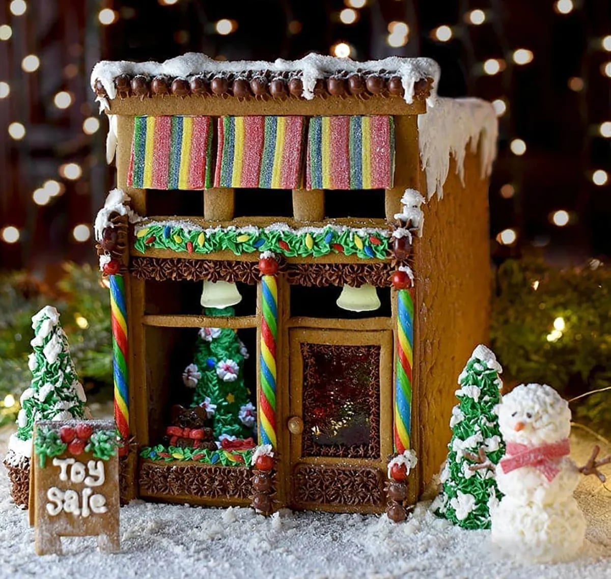 Whimsical Gingerbread Shop Facade Display — gingerbread christmas decor ideas 2026