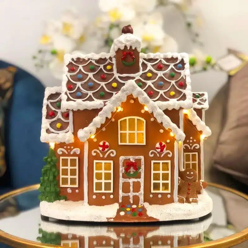 Illuminated Gingerbread House with Cozy Ambiance — gingerbread christmas decor ideas 2026