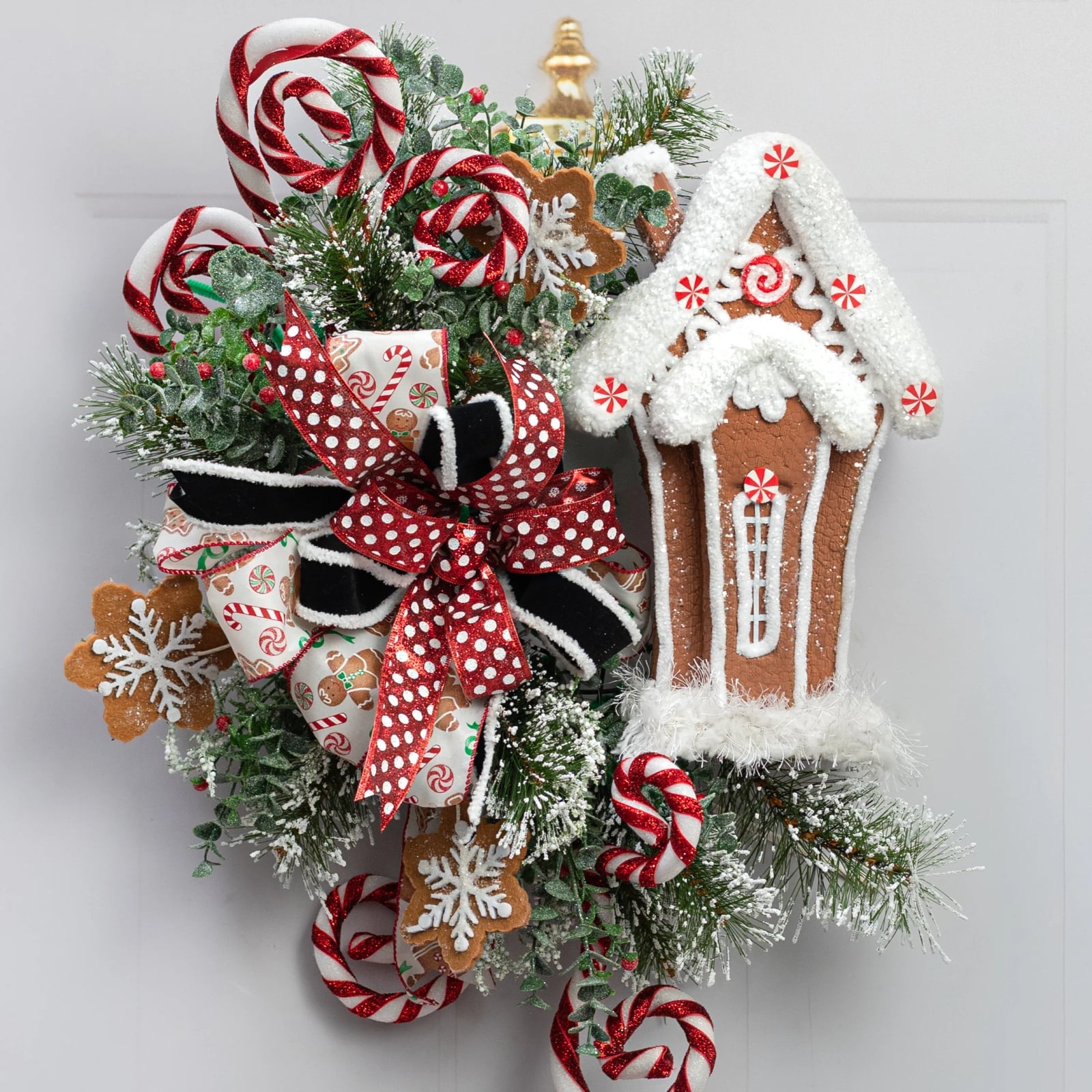 Festive Door Wreath with Gingerbread House Accent — gingerbread christmas decor ideas 2026