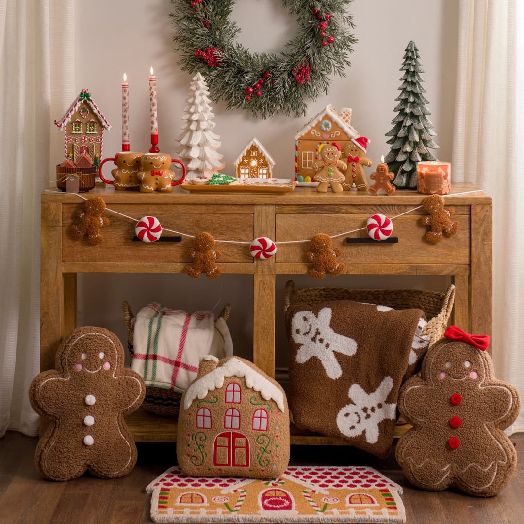 Console Table Styled with Gingerbread Figures and Wreath — gingerbread christmas decor ideas 2026