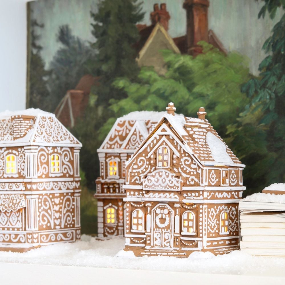 Cozy Rustic Shelf Vignette with Glowing Gingerbread Houses — gingerbread christmas decor ideas 2026