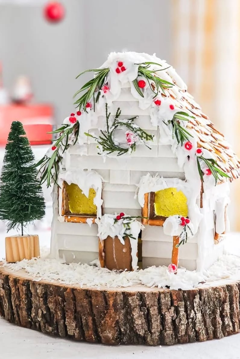 Rustic Gingerbread House on Log Slice Base — gingerbread christmas decor ideas 2026