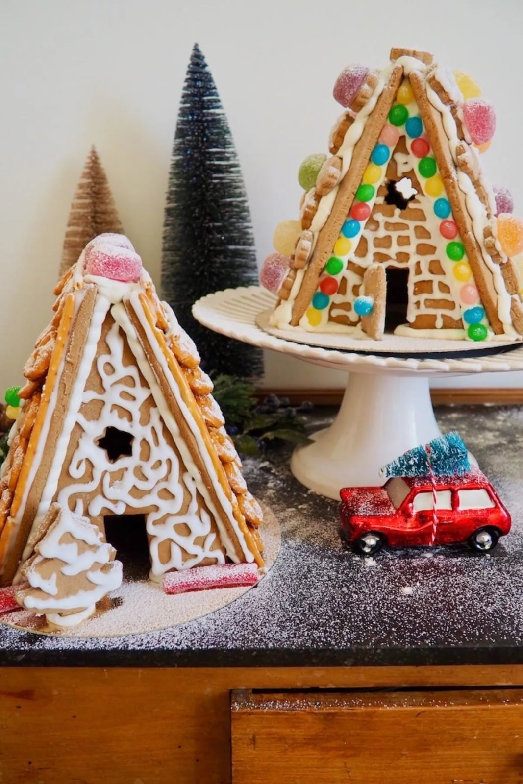 Whimsical Gingerbread Houses with Candy and Pretzel Decor — gingerbread christmas decor ideas 2026