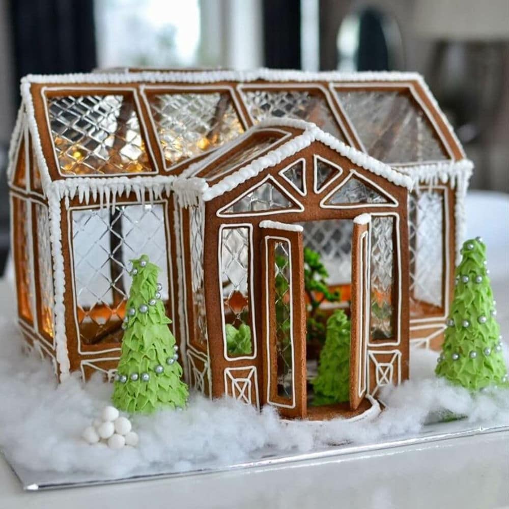 Intricate Gingerbread Greenhouse Centerpiece — gingerbread christmas decor ideas 2026