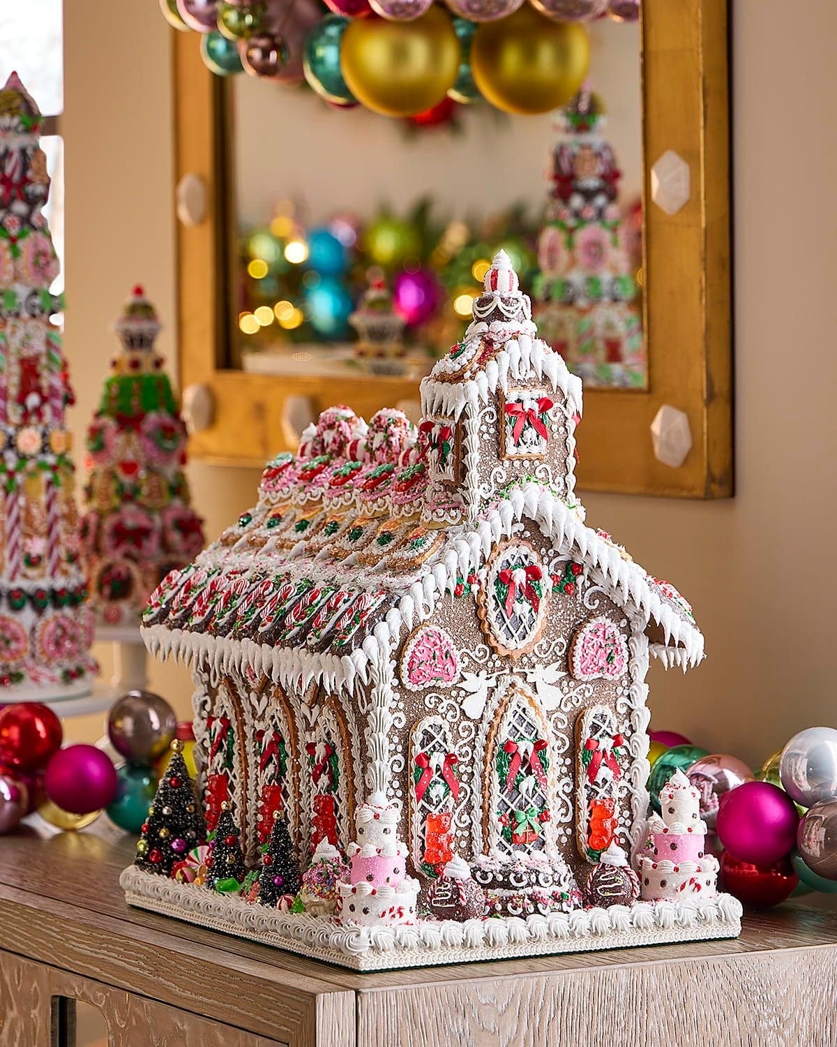 Shelf Display Featuring a Highly Decorated Gingerbread House — gingerbread christmas decor ideas 2026