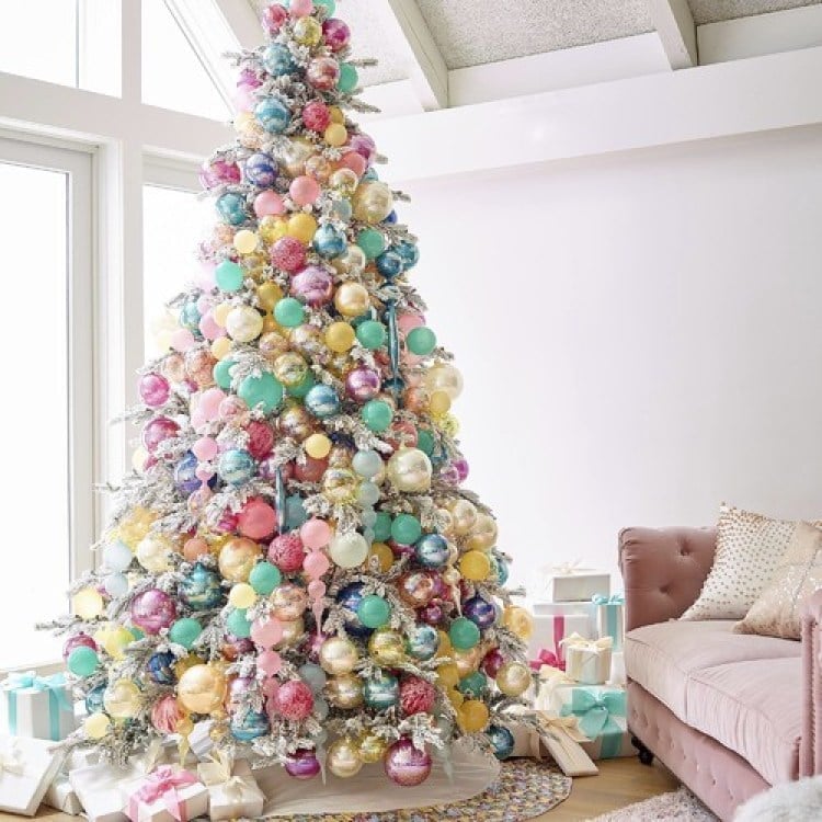 A Flocked Christmas Tree Dressed in a Symphony of Pastel Ornaments — pastel christmas tree 2026