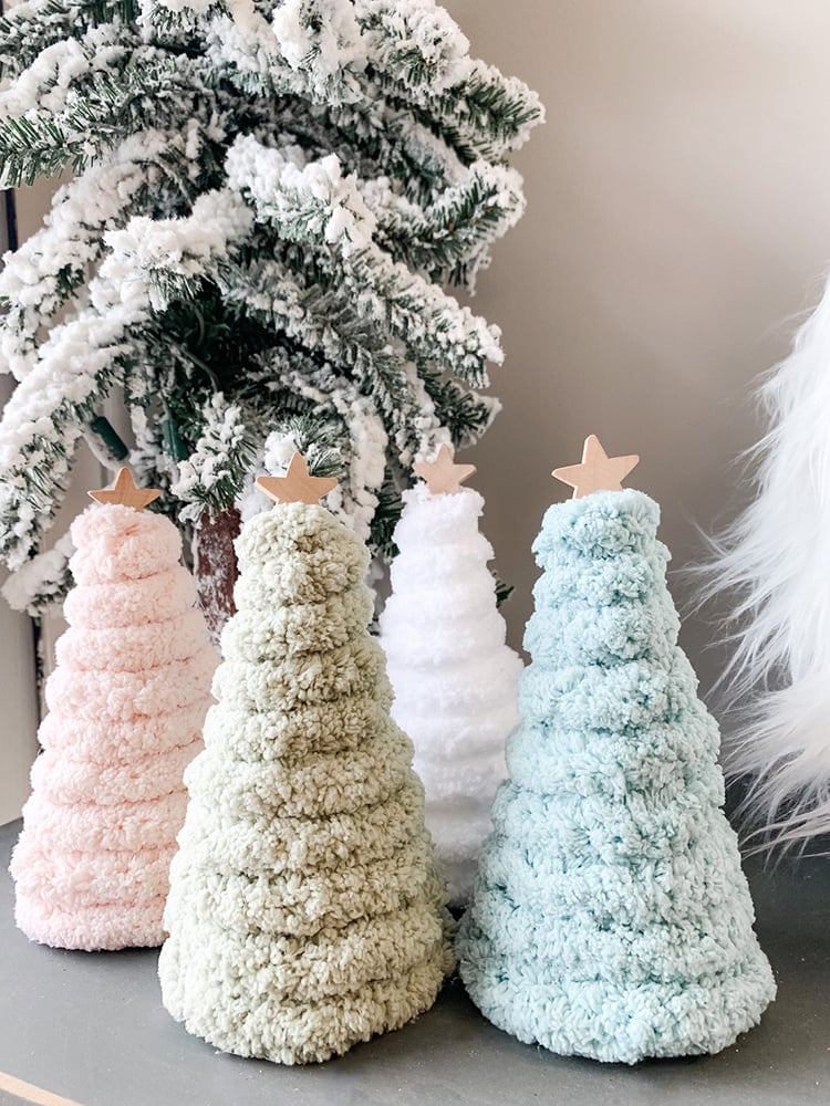 Charming Miniature Pastel Trees with Textured Yarn and Wood Stars — pastel christmas tree 2026