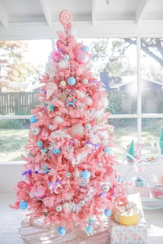 Vibrant Pink Tree with Playful Candy-Themed Decorations — pastel christmas tree 2026